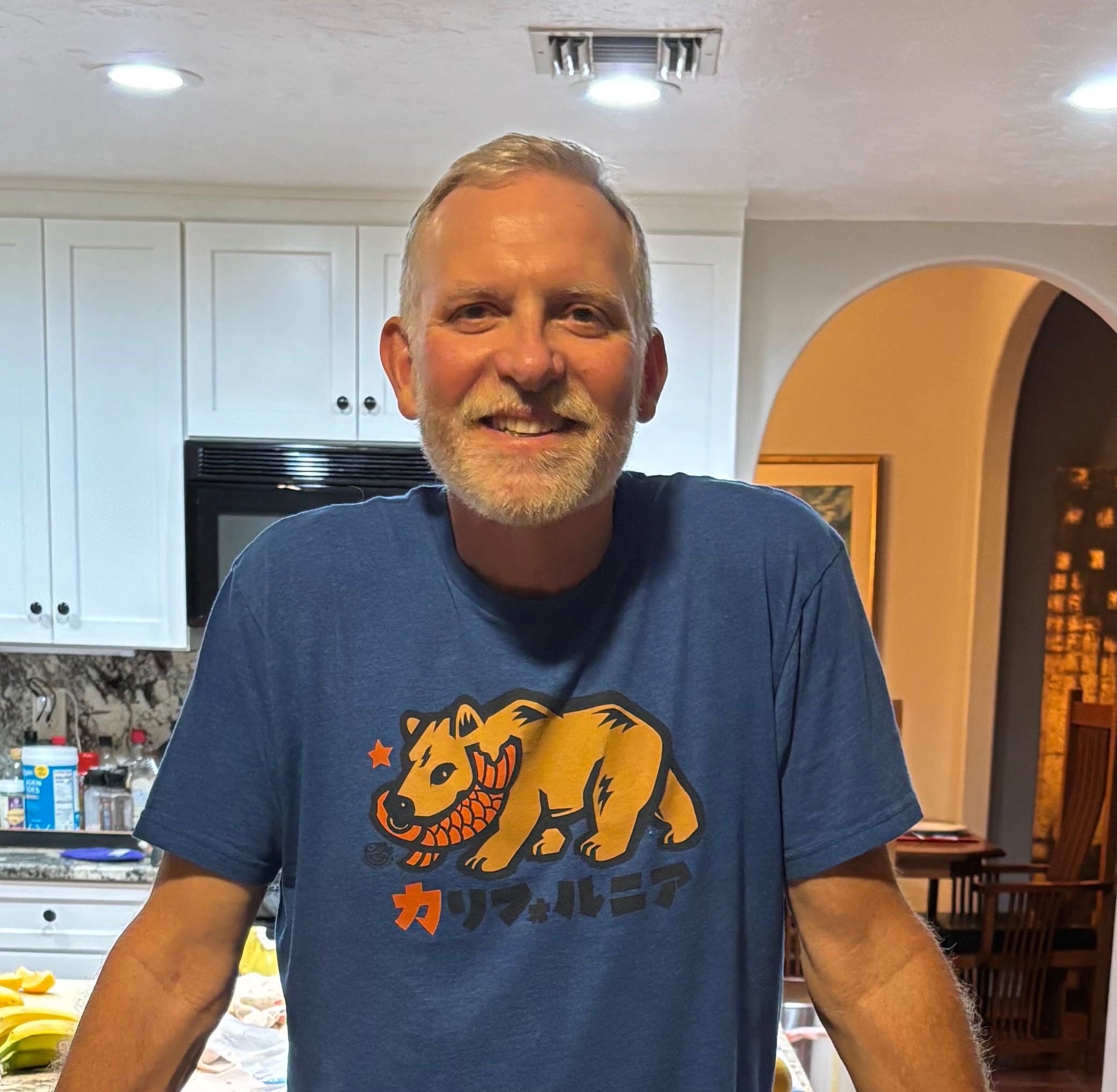 Peter Blakemore in a blue shirt